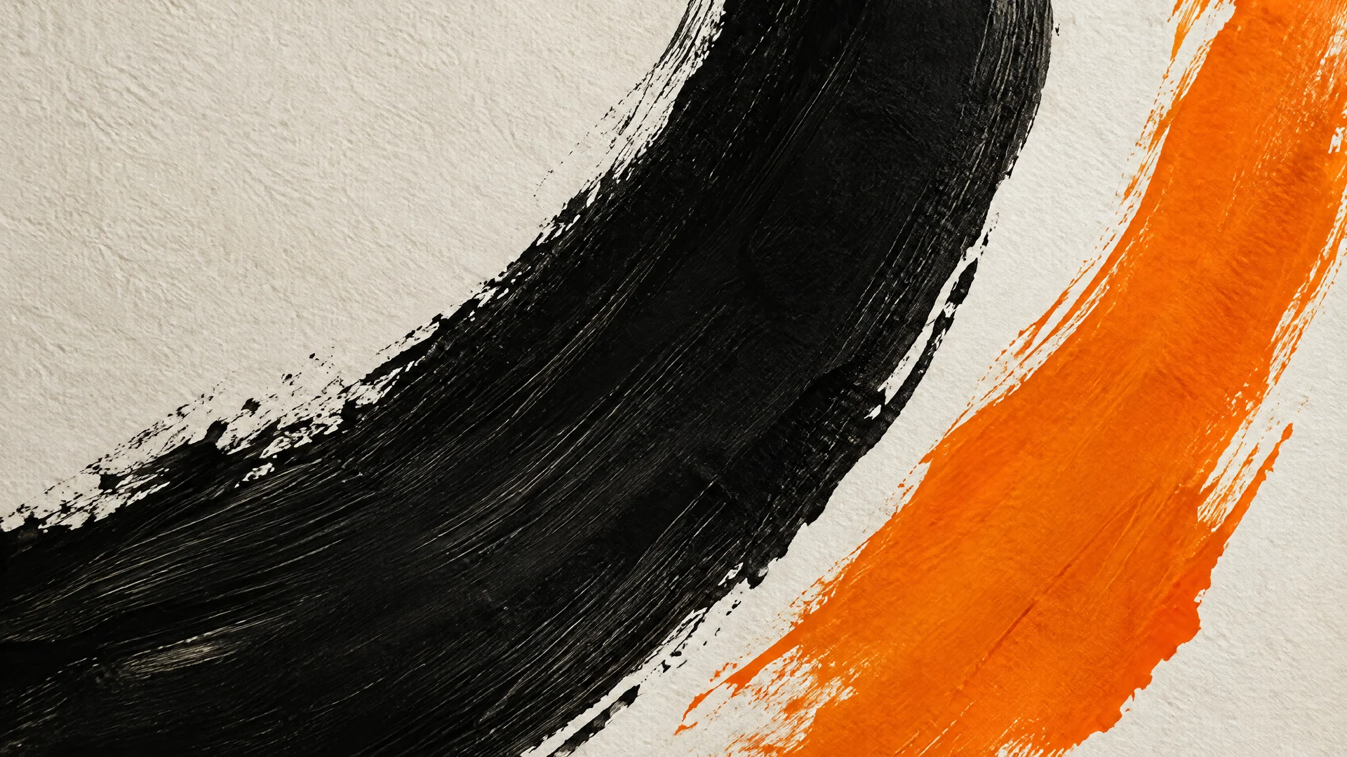 Broad black and orange ink strokes on textured cream paper